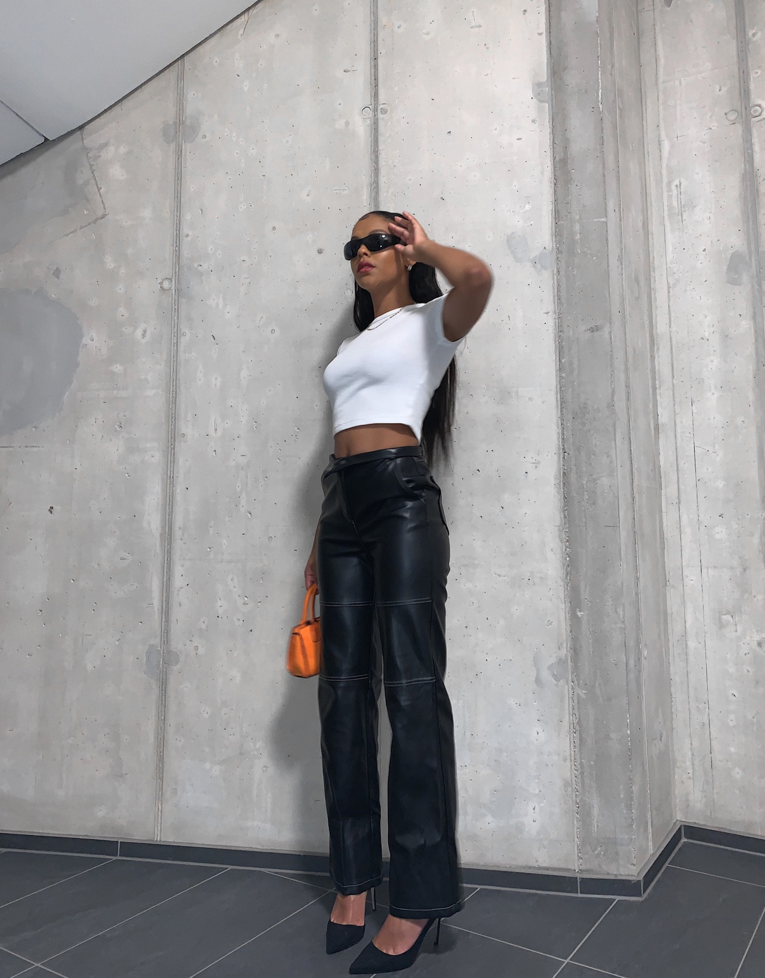 Inspired by (wo)men in black😎 Rocking sleek leather pants, a crisp white top, and accessorizing with stylish glasses and a pop of color with my vibrant orange mini bag. Ready to slay the day with this bold and trendy look! #FashionInspo #OOTD #StyleOnPoint

#LTKtravel #LTKMostLoved #LTKworkwear