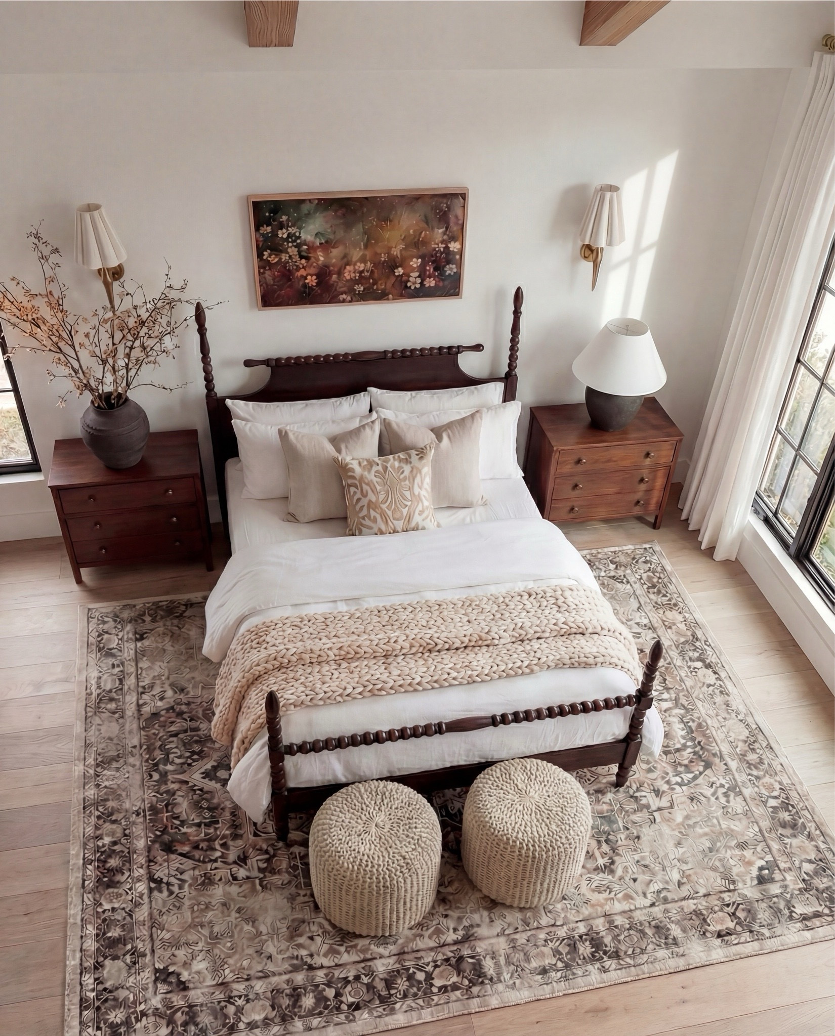 Shop the Look: Bedroom Refresh
• Dark wood spindle bed frame
• White cotton duvet cover + pillow shams
• Neutral patterned area rug
• Cream Chunky knit throw blanket (warm beige)
• Woven knit poufs ottomans (bedside or bench seating)
• Wood nightstands with brass knobs
• Black ceramic table lamps
• White tapered lamp shades
• Brass wall sconces
• Framed floral wall art
• Textured accent throw pillows (neutral tones)
• Ceramic decorative bowl (white sculptural style)
• Wood bead garland with tassel
• 

#LTKHome #LTKSaleAlert