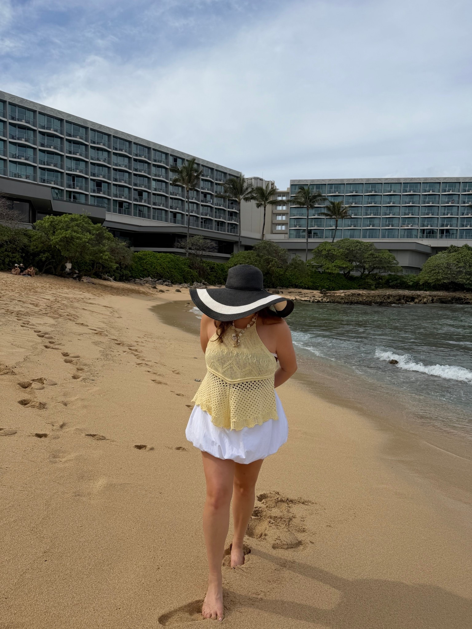 Lightweight Hawaii beach outfit — crochet tank top paired with a white skirt and sun hat #LTKtravel #LTKvacation 

#LTKMidsize #LTKFindsUnder50 #LTKTravel