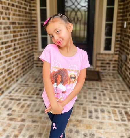Barbie t-shirt and leggings. My daughter’s leggings aren’t available anymore, but I linked a few similar options. 
This Barbie tshirt runs tts. She’s wearing a small. 
Target kids style finds  
#ltkgirls 
#ltkunder10

#LTKfamily #LTKkids