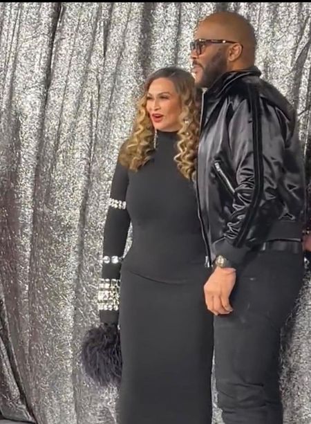 Tyler Perry posed with Ms Tina in Tom Ford. Ms Tina wore Dolce & Gabbana 