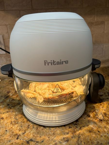 smart air fryer features a 5-quart glass-bowl design that lets you keep an eye on your cooking progress. It comes with six cooking settings: fries, chicken, meat, bake, fish, dehydrate—plus a rotisserie attachment and a rotating fry basket for achieving the crispiest fries ever. But the best part? Fritaire is easy to clean. Simply add water and dish soap to the bowl, turn it on, and let the hot air do the work.

#LTKFitness #LTKHome #LTKGiftGuide