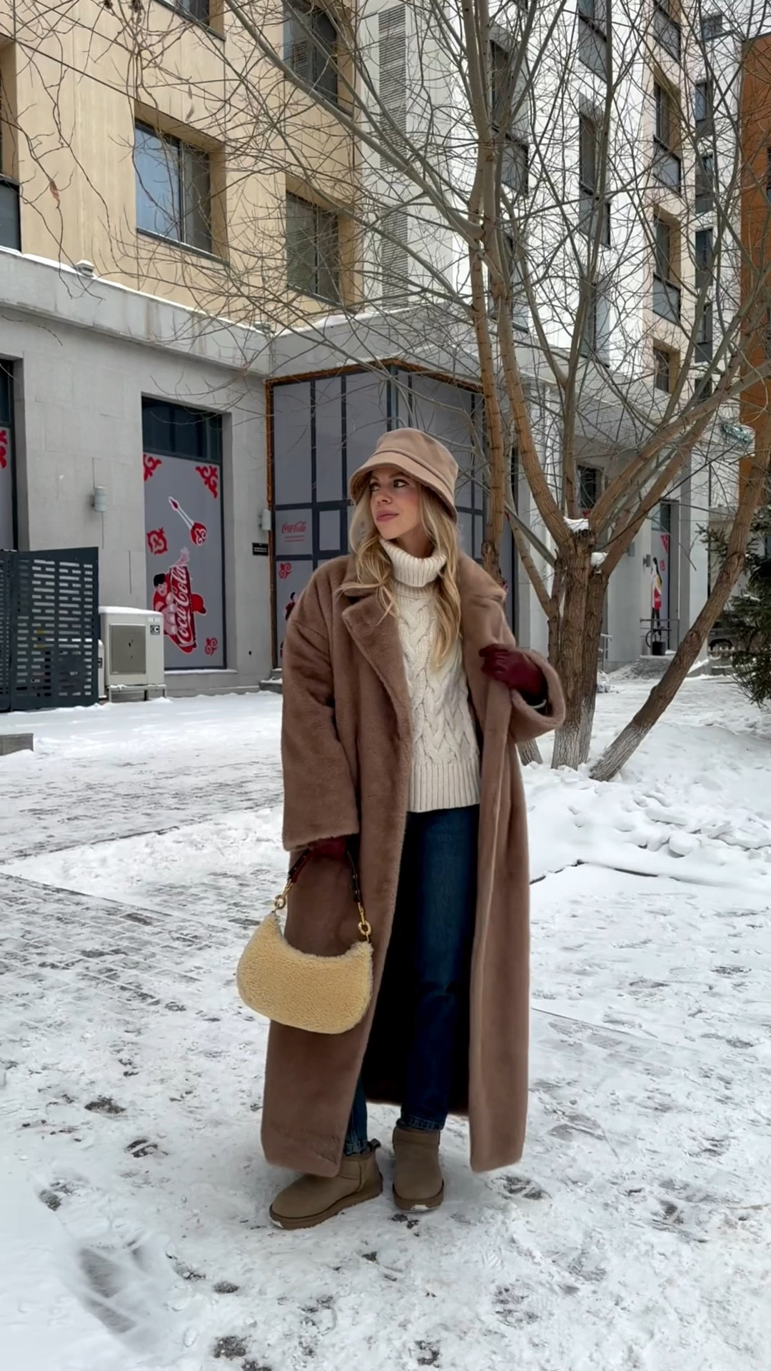 Camel beige fur coat, shearling fur bucket hat, cable knit sweater, Zara mom jeans, shearling handbag, style over 40

#LTKOver40 #LTKootd #LTKSeasonal