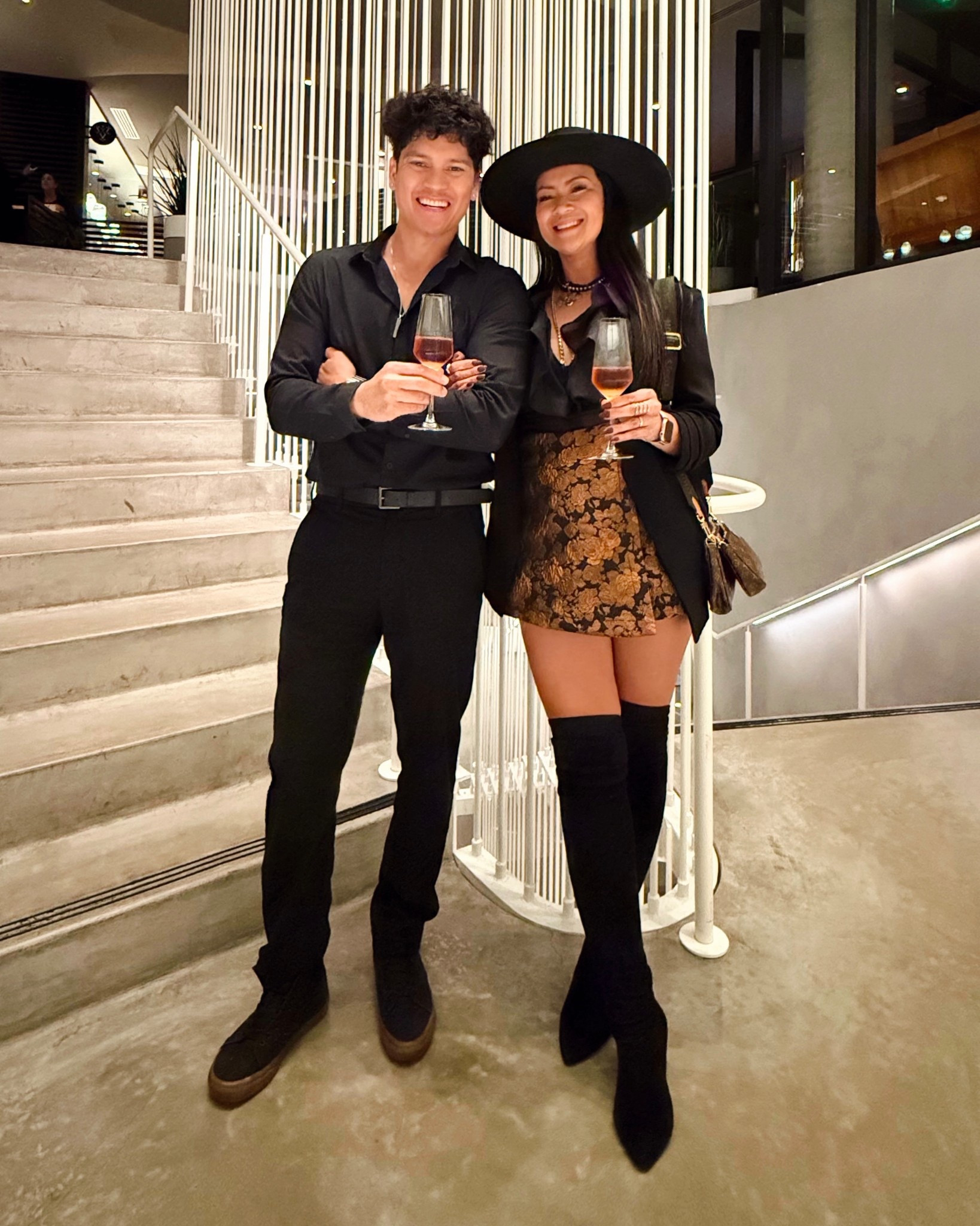 Date night outfit inspo 💫 Wearing my favorites — a wrap skirt that slims my tummy area, a wide brim hat for that chic touch, and over the knee boots that don’t slouch and fit perfectly. Comfortable while feeling put together for a night out! He’s in a slim button-down and black pants for an easy, classic men’s date night style.

#LTKMens #LTKParties #LTKShoeCrush