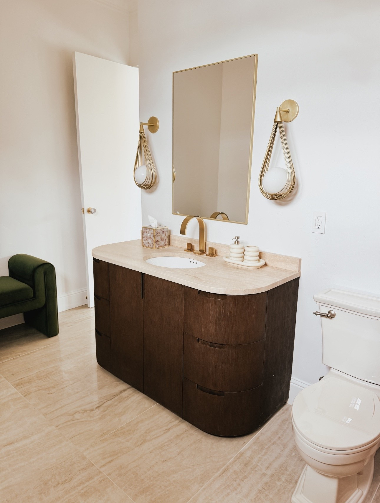 This guest bathroom is so unique with the tear drop sconces and gold faucet finishes with a pop of green in the bench 

#LTKHome
