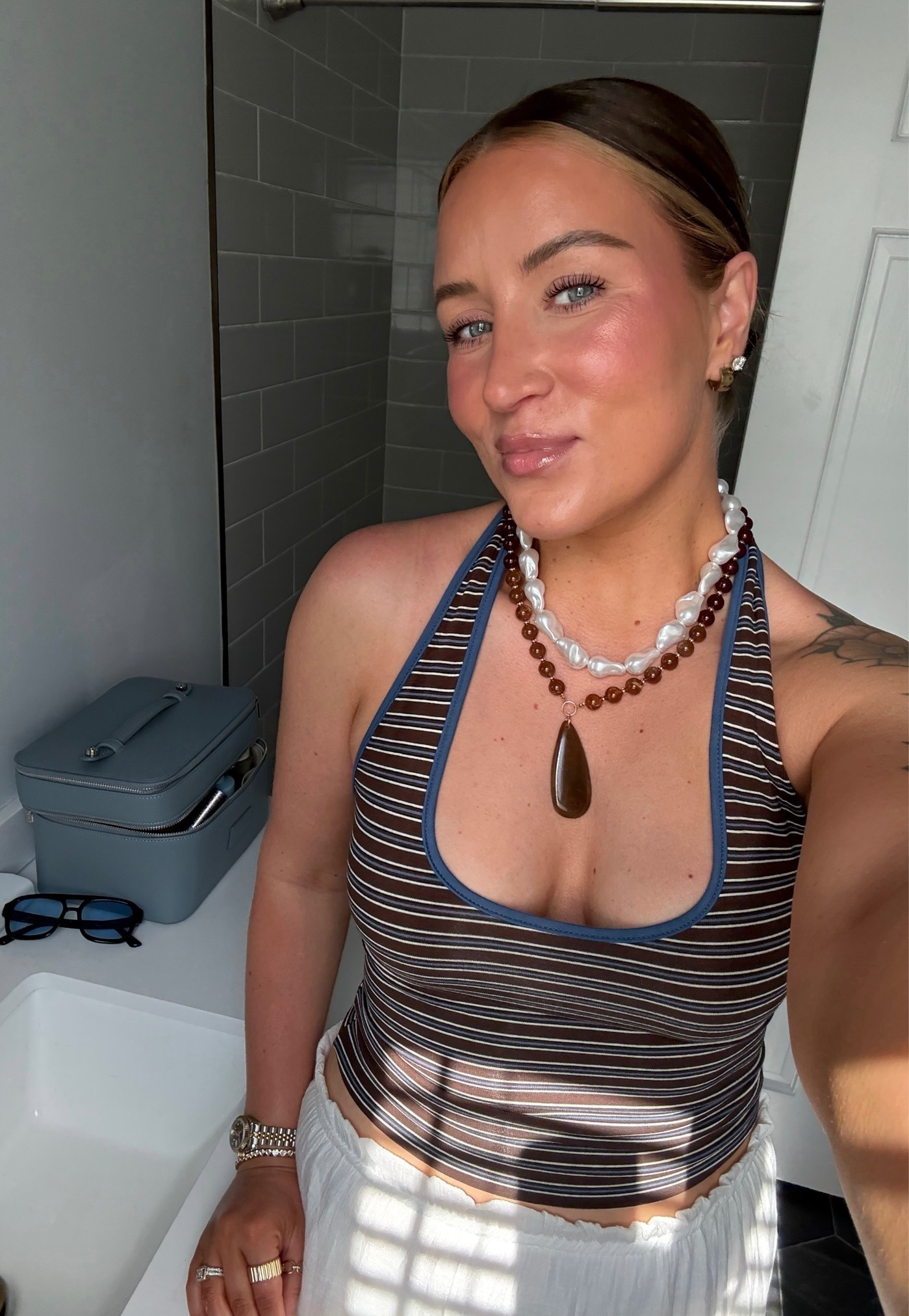 Summer vacation outfit. Striped halter top. Beaded necklaces. Summer outfit. Beach outfit.

#LTKootd #LTKSeasonal