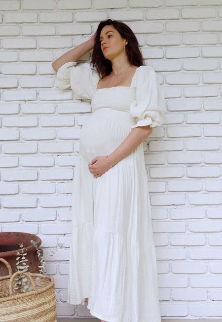 Cute cottage style summer maternity dress. @sarahchristine wearing Nothing Fits But Kiko Dress Soft muslin dress with puffed sleeves, smocked chest and sleeves in Seattle, Washington. Summer Maternity Dress, Maternity Maxi Dress , Maternity Midi Dress, Casual Maternity Dress.

#LTKSeasonal #LTKbump #LTKfamily
