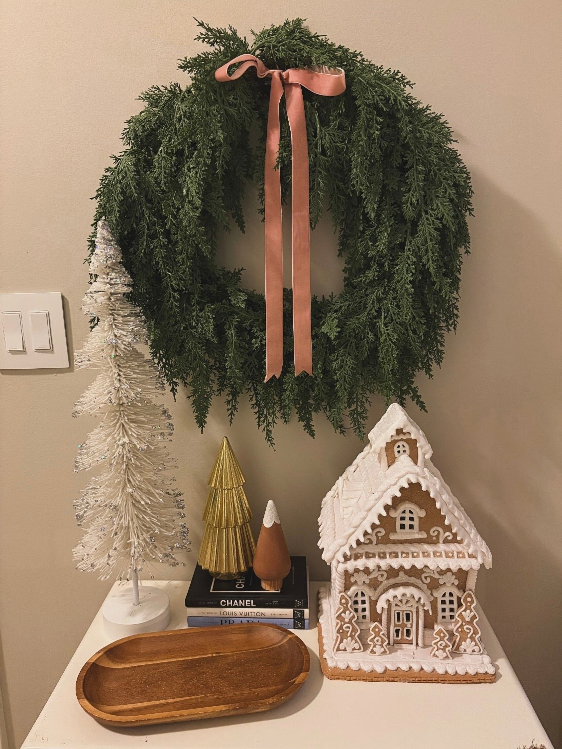 My front table holiday decor! Linking as many exact if they are current or still being sold from previous years - otherwise sharing some are similar!

Cedar wreath, Walmart Christmas decor, Target Christmas decor, Michael’s Christmas decor, Tjmaxx and Marshalls, gingerbread house, bottle brush tree, velvet ribbon, wood trees

#LTKHome #LTKHoliday #LTKSeasonal