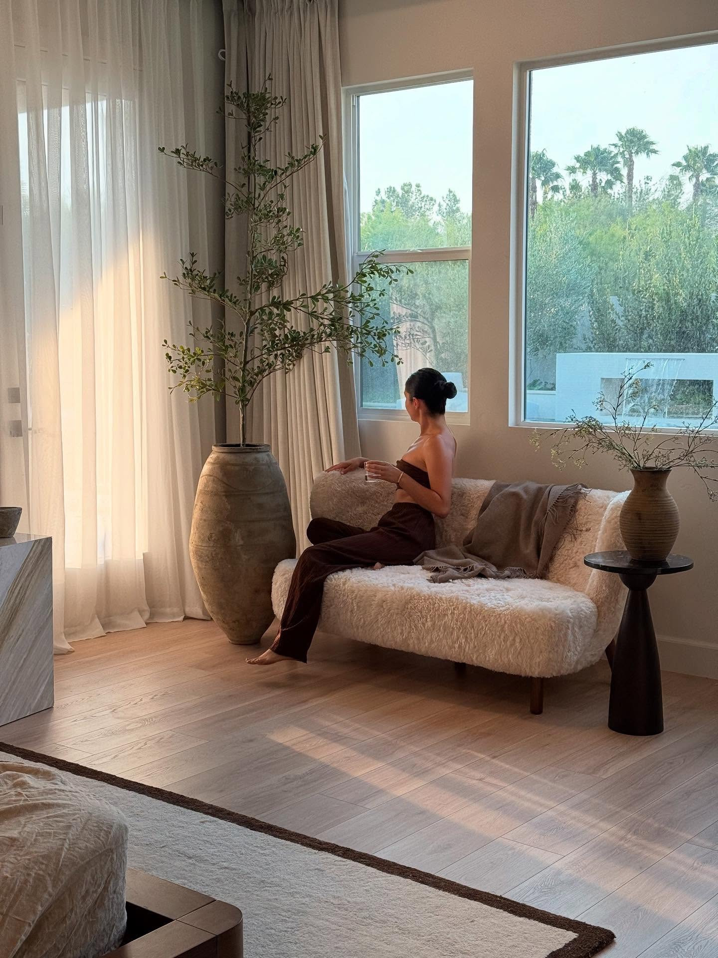 Love this bench by @manhattan home design 
I tagged a few other of my favorites! 

When the husband has the toddler and you get to enjoy the view.. for about 5 mins 🤍

I love mixing sheer and blackout curtains so I can get a little bit of both worlds, because nothing beats that golden hour view

And this bench by  made the absolutely coziest corner!

I paired it with warm tones and green stems, to let light of golden hour shine by itself 🤍

#LTKHome #LTKautumn