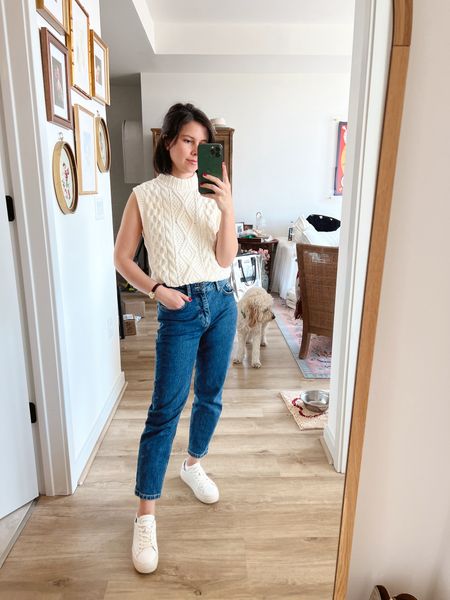 The white Ralph Lauren cableknit sleeveless sweater that I wear at least once a week is sold out, but I rounded up a few similar ones. It’s such a great year round piece!

I’m wearing Short Girl Jean which I can’t link to on the app but if you go to their site and use code MONICA you’ll get 15% off!

White sneakers have been a go too - I think the platform makes wearing sneakers more flattering with jeans. Found the Solids sneakers on Amazon!

Linked some other similar jeans just in case!

Ralph Lauren Sweater: XS 
Short Girl Jean: 23 Short in the Kathleen
Sneakers: 6 (I wish I had done a 5.5 which would be sizing down a half size for me. I originally tried the 5 and they were WAY too small).

#LTKshoecrush #LTKfindsunder100 #LTKstyletip