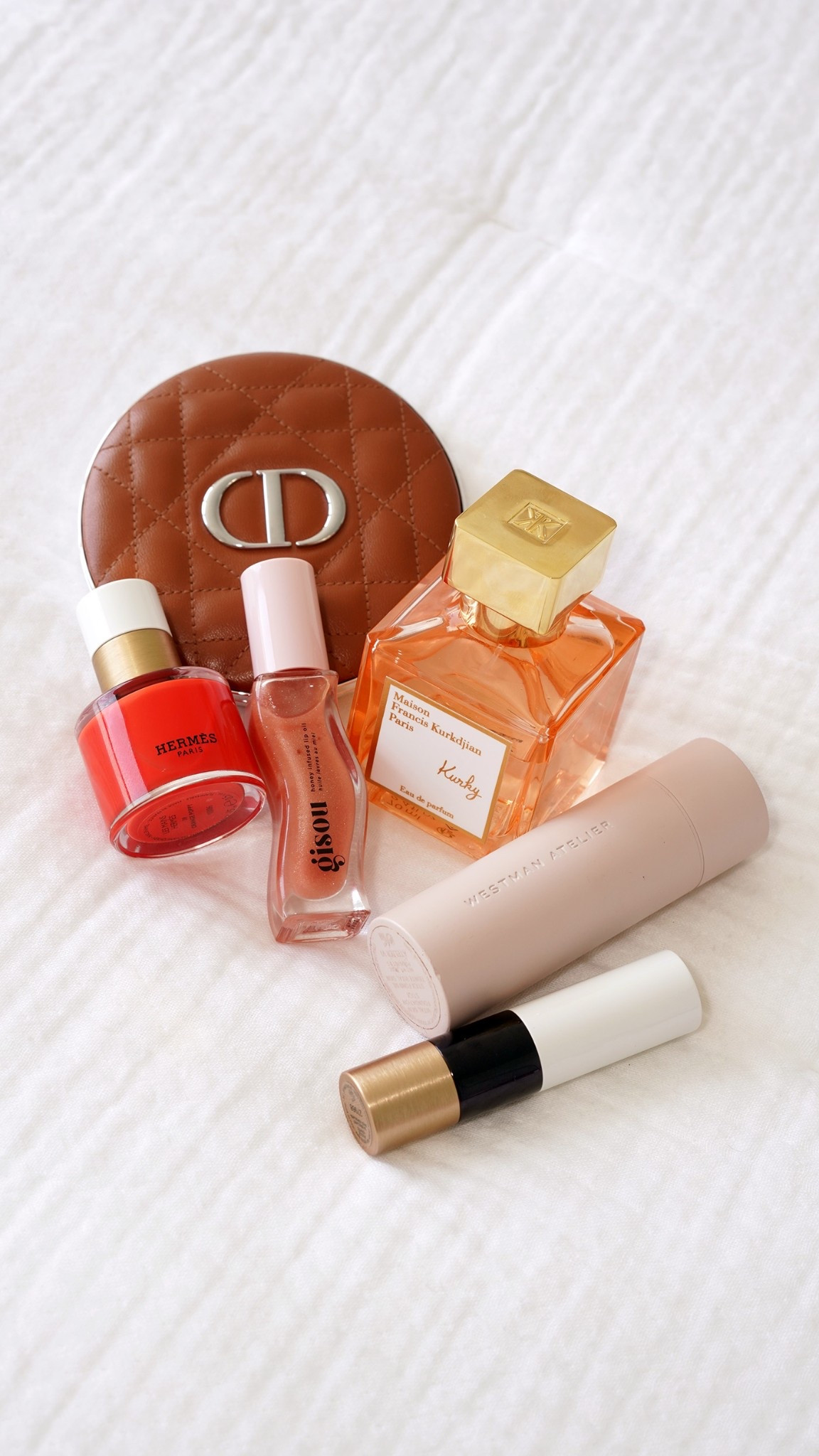 Beauty favorites this week

Hermes Nail in Orange Poppy
Gisou Lip Oil Glazed Plum
Hermes Shine in Rose Himalaya
Kurky Perfume
Westman Atelier foundation stick VI
Dior Jumbo Bronzer #20

#LTKBeauty
