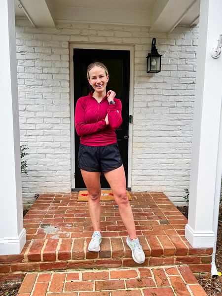 Athleta running shorts (size XS), an Athleta 1/4 zip (size XS), and New Balance sneakers. This is the perfect outfit for a 50 degree run. #runningoutfit

#LTKunder100#LTKSeasonal#LTKshoecrush