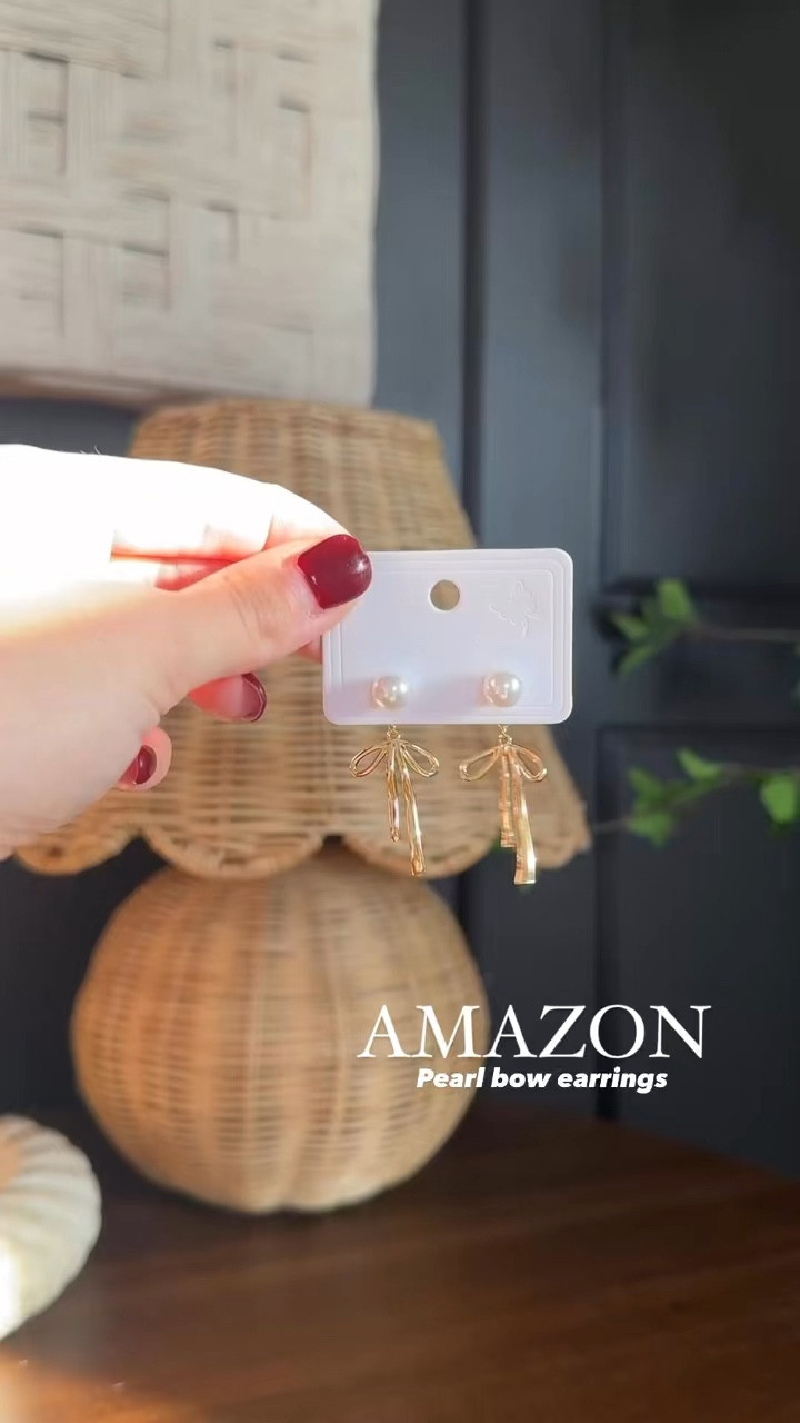 14K gold bow pearl dangle drop earring from Amazon under $10 - a great gift option for family/friends or to treat yourself! 

#Amazonfashion
#LTKFindsUnder50 #LTKStyleTip