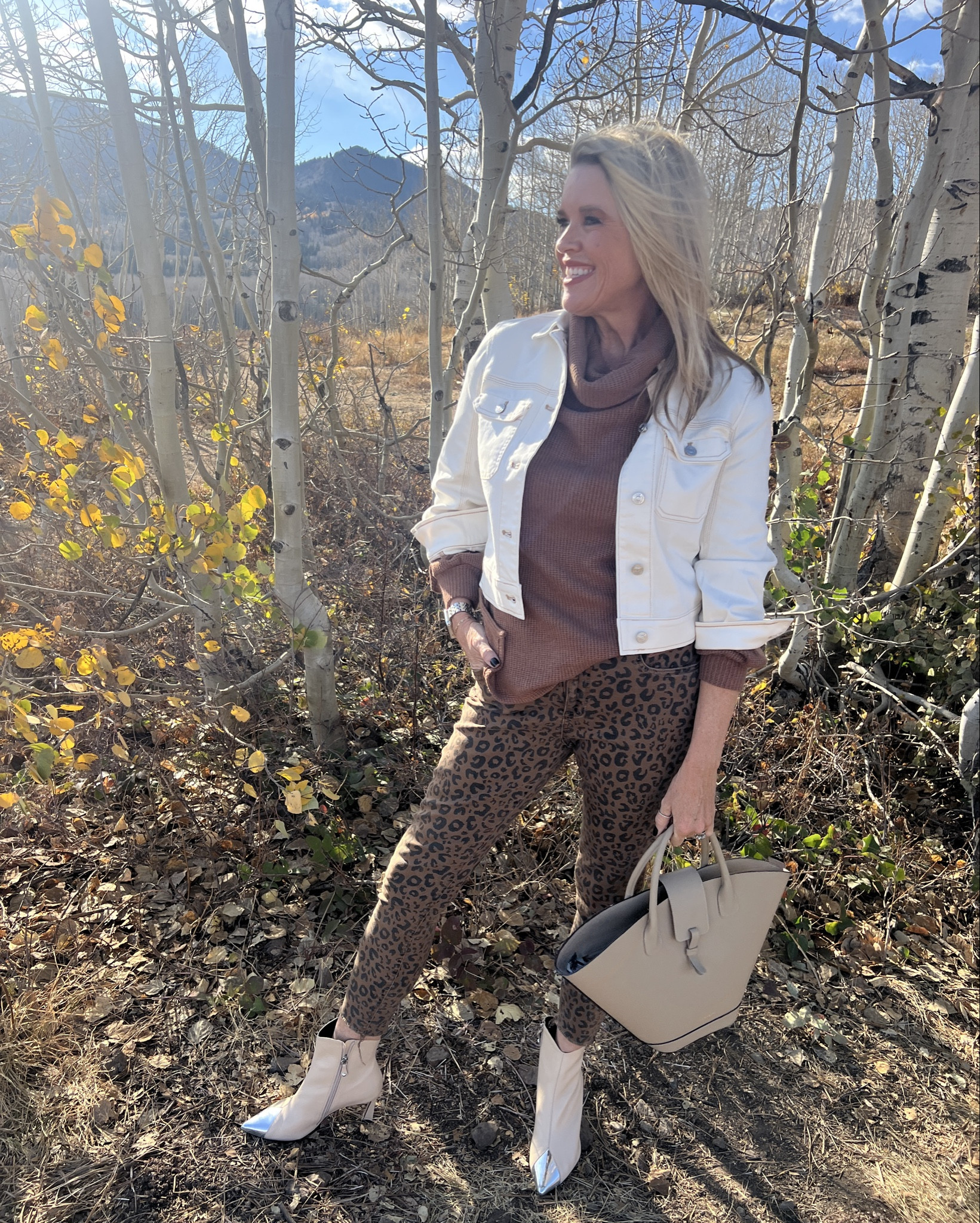 #ootd fall outfit inspo
Way to wear white and leopard 
For Fall

Chicos denim jacket with gold stitching 
On sale  $59 so good and fits tts I am wearing a Chicos 0 (4) off white

Gibson look waffle turtleneck long sleeve top
Comes in saddle (camel)  grey and black on major sale $45.50 limited sizes in each color I am wearing small 
🍁Save 10% off non sale with code DARCY10

Leopard skinny jeans Kut from Kloth sold out linked similar  wearing tts 
 Off white bootie with silver cap toe 
Cecilia New York 

Ivory  Paris 64 leather bag 

Jewelry - Amazon find earrings 
$22-14 
Designer look slimes for way less




#LTKStyleTip #LTKSaleAlert #LTKFindsUnder50