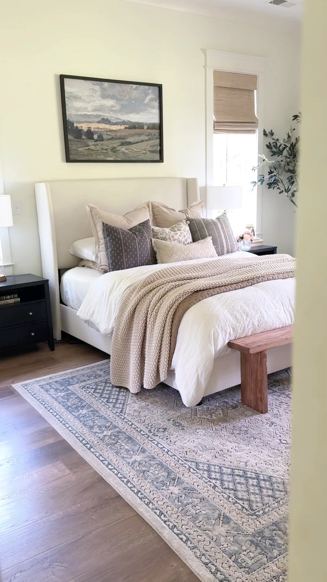 We wanted our primary bedroom to feel light and airy—refined yet relaxed. Soft blues, beiges, and creams set the tone, while layered textures from the curtains, layered bedding, and an area rug make it our cozy retreat. 

#LTKHome