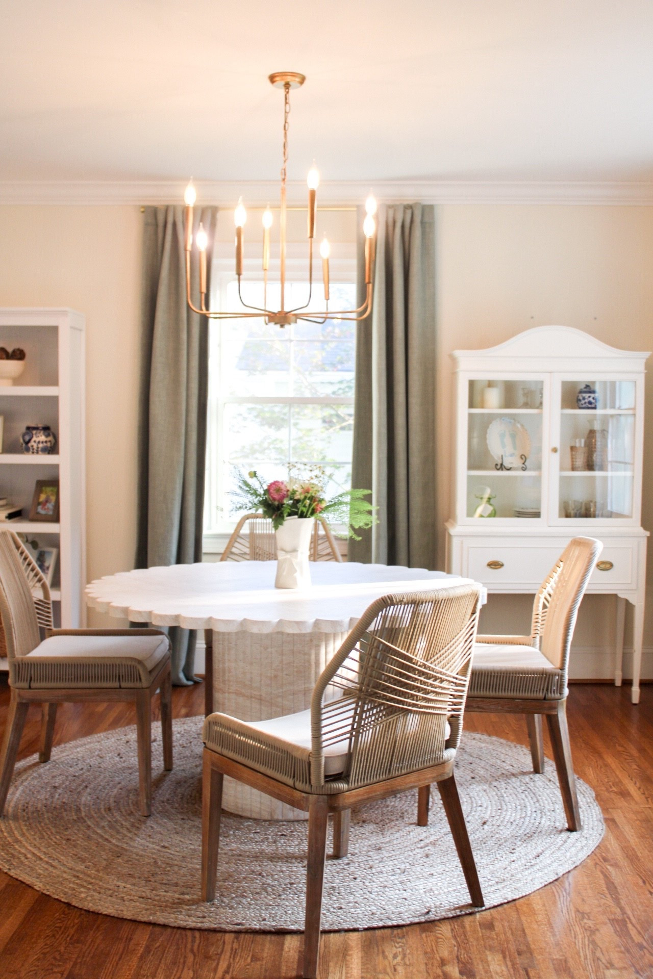 This dining room table is gorgeous! I love the scalloped detail and the brightness it brings to this space - can you believe it’s from Amazon?! 

Chairs are old from TJ Maxx!

#LTKHome #LTKStyleTip #LTKFamily