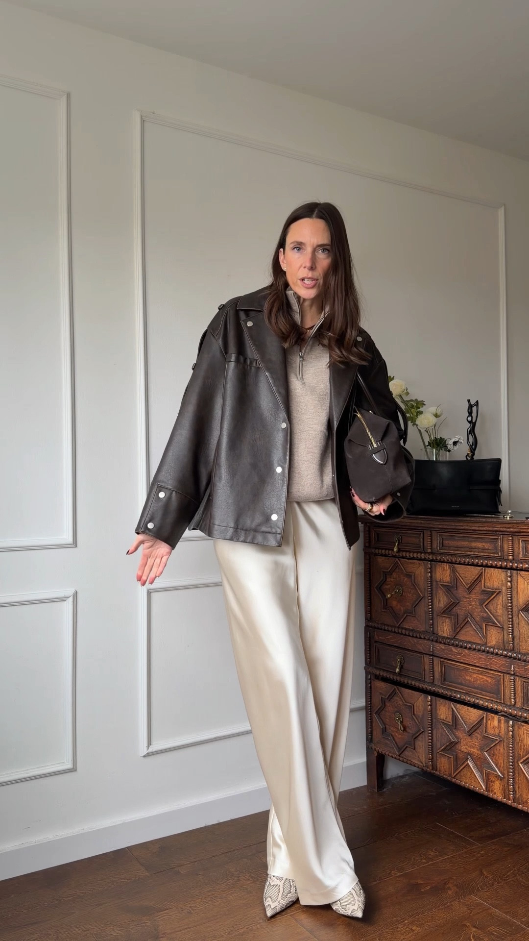 A more elevated reimagining of the viral Chanel catwalk look starring a wool half zip that will set you back… I actually can’t do the maths. A tiny fraction of the Chanel one, at any rate!

Satin trousers, espresso brown leather jacket, espresso brown suede bag, snake print boots 

#ltkstyletip #ltkshoecrush

#LTKootd #LTKgrwm #LTKSeasonal