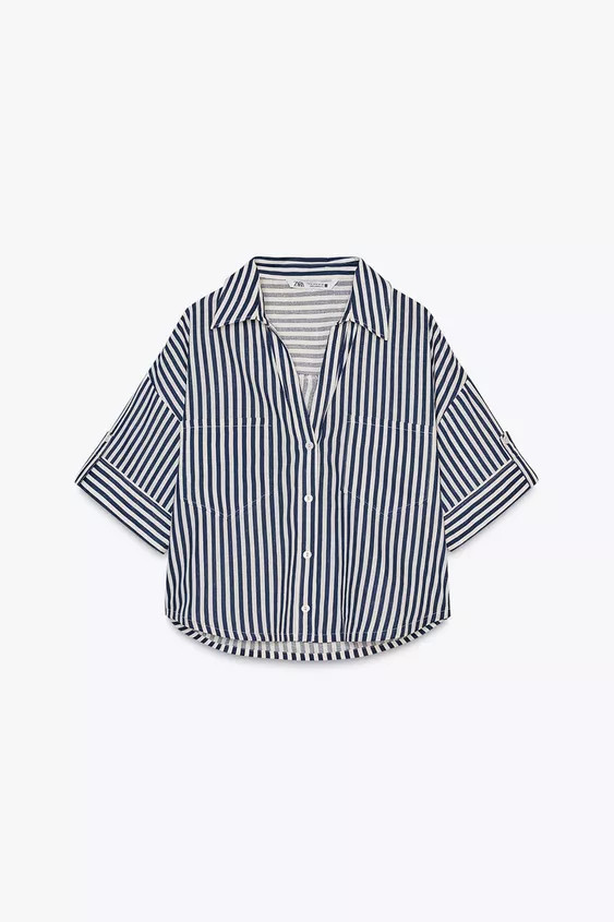 Linen shirt with a revere collar and v-neck, short sleeves, front patch pockets and button fasten... | Zara US