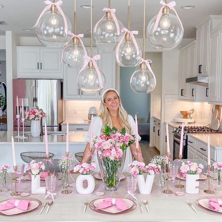 Valentine’s Day Tablescape! So cute for a Galentine’s or Bridal Shower Tablescape too!💕
.
.
Now napkins, pink plates, pink flatware, valentines vases, pink candles, gold candlestick holders 💗

#LTKparties #LTKhome #LTKwedding