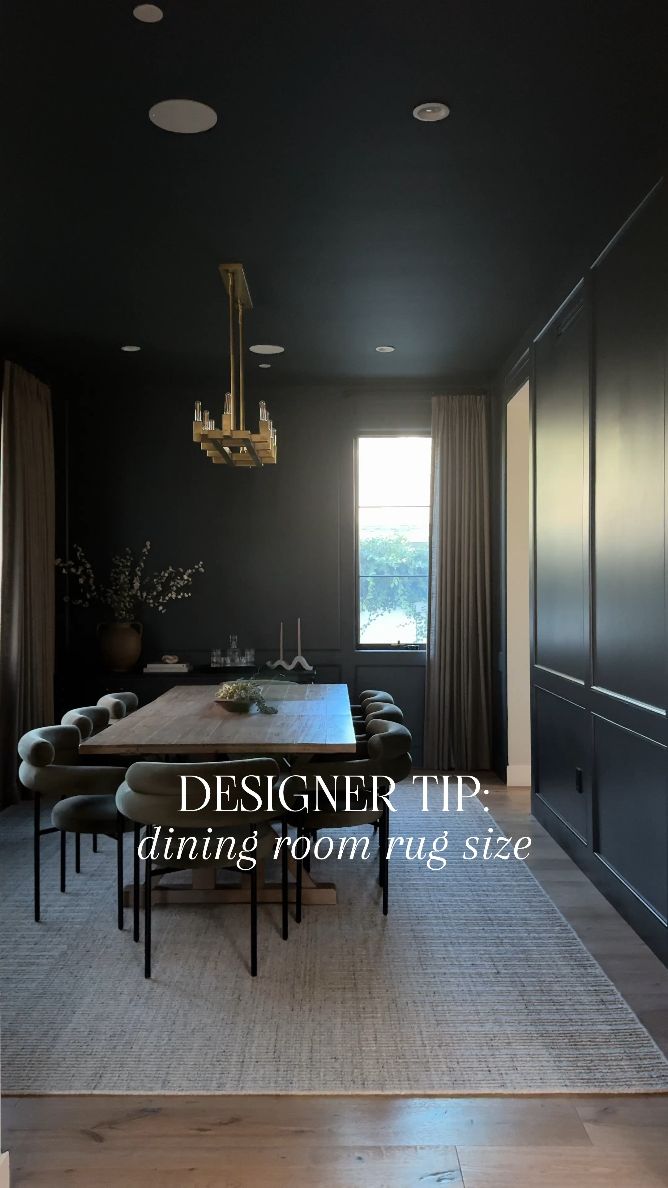 This rug pulled the entire room together. I love the texture and neutral tones and added to the room. It’s soft under your feet and on major sale. Too often I see rugs that aren’t large enough for the dining room. If you use one, when the person pulls her chair, it still needs to be on the rug. This is the grey color 

Moody dining room green dining chair wood table vintage dining table farmhouse table brass chandelier grey rug gray, drapery, black rod hanging rod Wood console table, black mirror arched mirror, arch mirror

#LTKHome #LTKFindsUnder100 #LTKSaleAlert