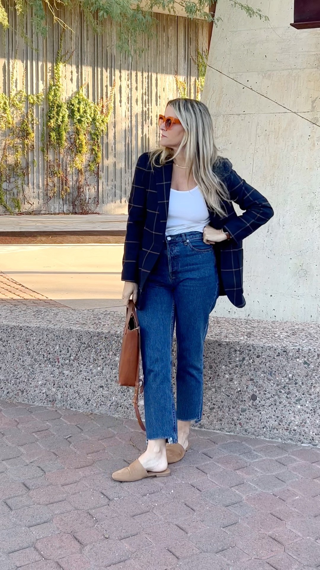 Preppy vibes today with a Madewell navy blazer, but also kept it not so serious with some Cheeky, 90s straight leg denim from Everlane that I added a little chewed hem to, paired with one of my current go to pairs of slides from Target and a leather tote. Topped it off with bright sunglasses to counter the structured blazer. Felt cute, will repeat this outfit for sure. 

#LTKstyletip #LTKworkwear #LTKSeasonal