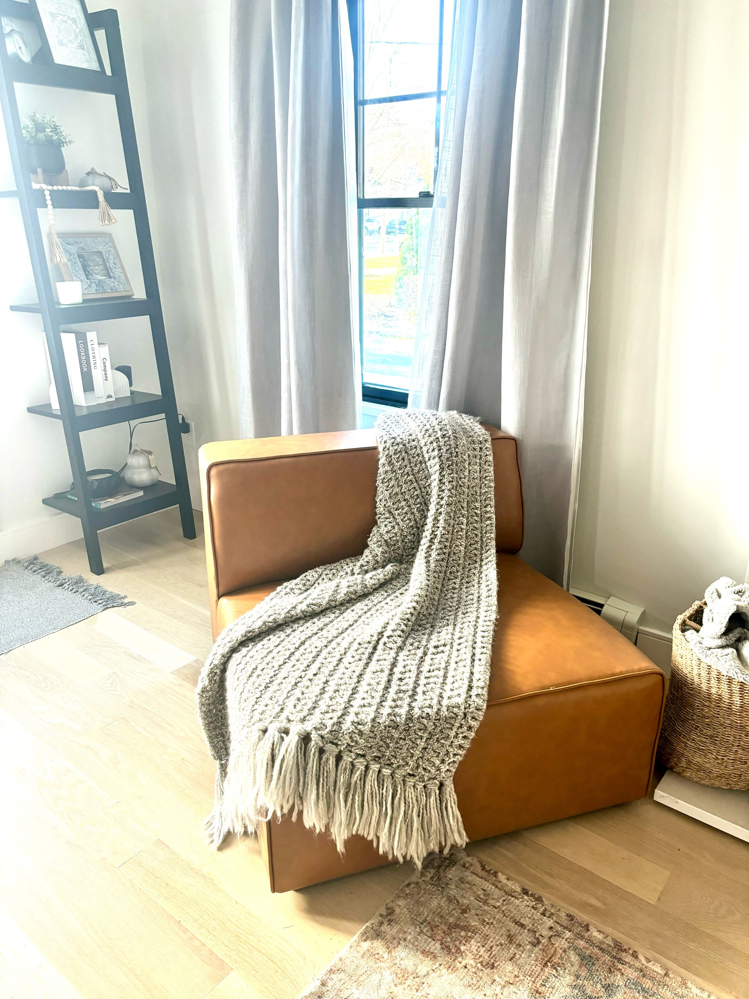 Beautiful tan, armless leather chair for my living room. Simple, modern, minimalist style to warm up your home. Interior design idea.  I got mine for under $600!

#LTKCyberWeek #LTKCyberSaleUK #LTKhome