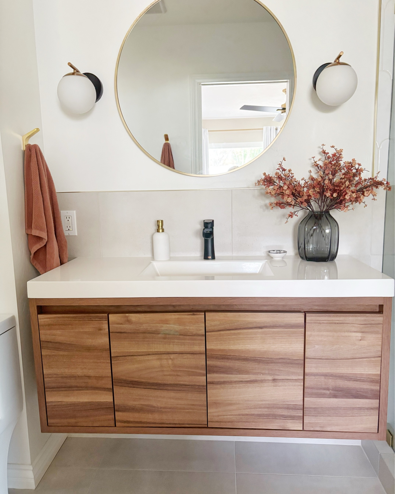 Julie also transformed a tiny master bathroom into a masterclass of quiet luxury without breaking the bank here.  It’s all about choosing the right materials.  Her shower tile is currently on sale for under $10 a square foot!  Most of these materials didn’t cost any more, it was about choosing the right mix.  👌

#LTKHome