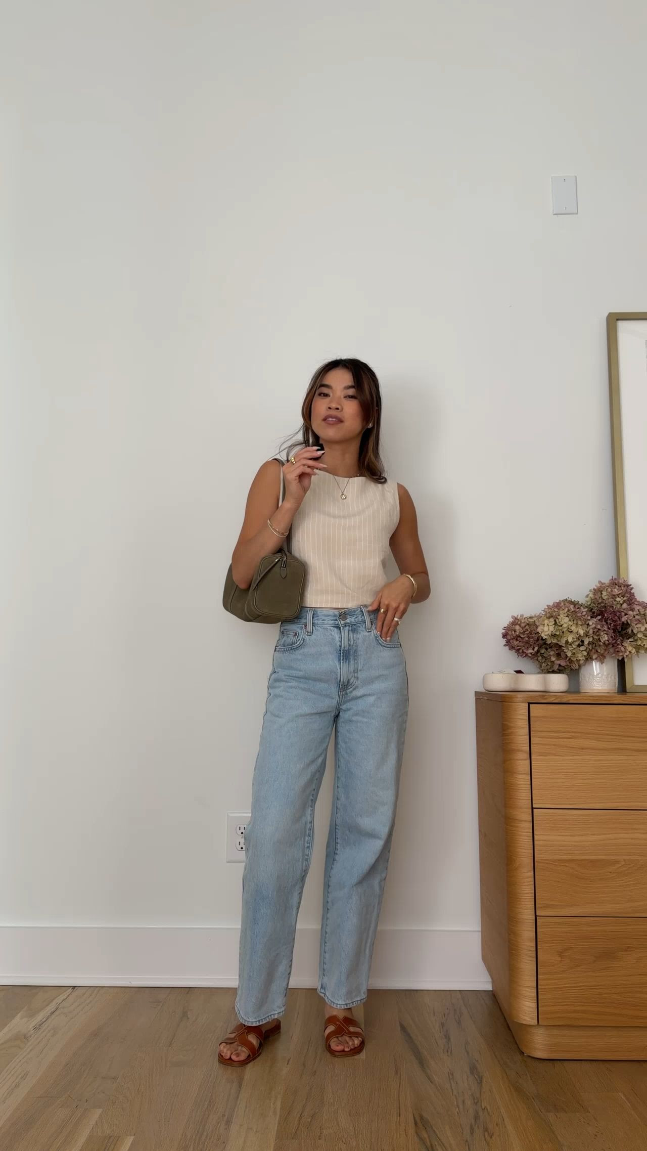 The perfect summer denim from @Aritzia. I love this light wash!

Sizing info:
- Aritzia Cavalier Top (TTS or size up, runs snug, Size 2XS in Byrd Strp Ntrl Ecr/ok)
- Aritzia Denim Forum The Farrah Hi-Rise Wide Ankle Jean (Size 24 in Vintage Light Blue)
- Margaux the MX sandal (In Saddle Calf)

Petite style, petite fashion, mom outfit, mom style, petite pants, petite outfit ideas, petite outfits, best pants for petite, petite denim, spring style, spring outfits, beach outfits, vacation outfits, summer outfits, Summer style, summer trends, aritzia denim

#LTKootd #LTKSeasonal #LTKPetite