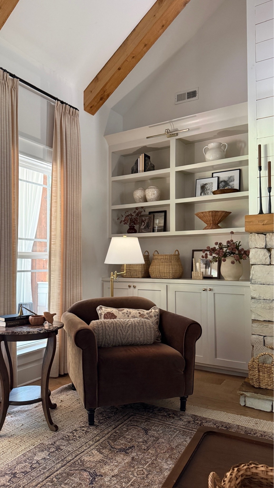 Where you can find my spending my weekend 🤎🍂🎃 It’s such a cozy corner and this chocolate brown chair is an all-time favorite purchase.

#LTKHome #LTKSeasonal