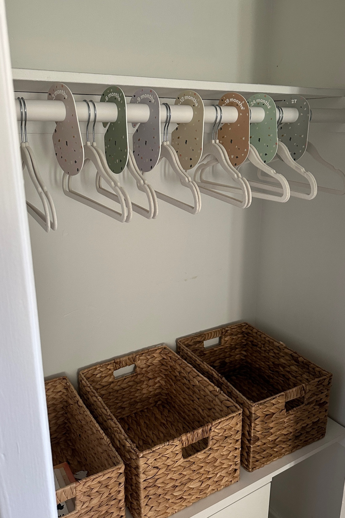 Nursery closet with baskets for storage, small hangers for baby clothes and dividers for all the different sizes  

#LTKfindsunder50 #LTKbaby #LTKhome