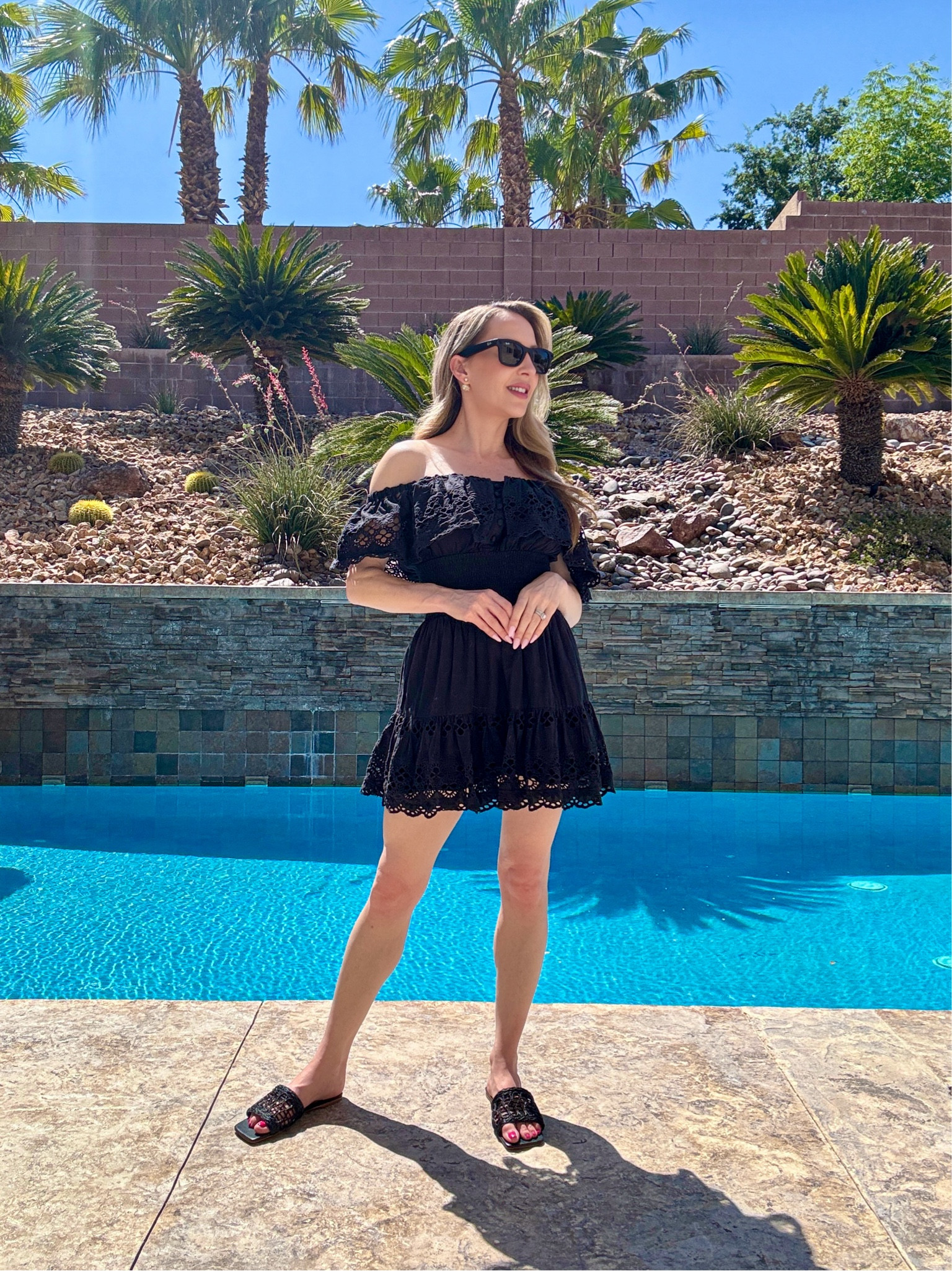 Strapless black mini summer dress and black slide sandals are an easy way to take your summer look into Fall with darker colors. I love the elasticated cap sleeves on this for a more flattering and comfortable fit. 

#LTKTravel #LTKSeasonal #LTKStyleTip