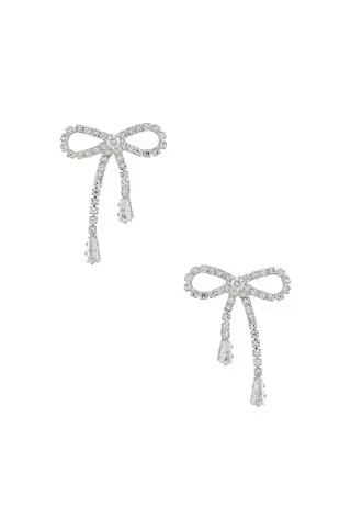 SHASHI Petite Bow Earrings in Silver from Revolve.com | Revolve Clothing (Global)