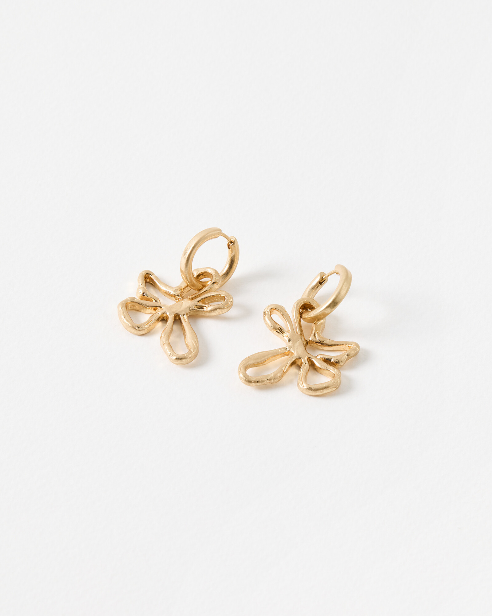 Jackson Brass Flower Charm Hoop Earrings | Oliver Bonas | Oliver Bonas (Global)