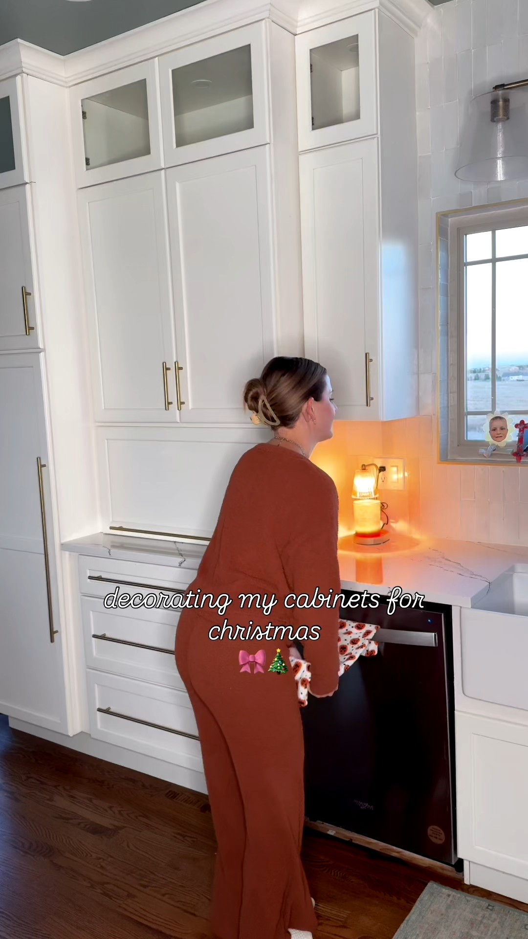 🎀 The easiest Christmas kitchen makeover! 🎄✨ Turn your cabinets into festive “presents” with just ribbon, tape, and a bow! So simple, but it instantly makes your kitchen feel like Santa’s workshop. 

Tutorial:
How to Decorate Your Cabinets for Christmas 🎁
	1.	Choose a wide ribbon in your favorite holiday color — red, gold, plaid, or whatever matches your decor!
	2.	Cut two strips of ribbon — one long piece to go vertically and one shorter piece to go horizontally across your cabinet door.
	3.	Tape each ribbon to the inside edge of your cabinet door so no tape shows on the front.
	4.	Where the ribbons cross, attach a large festive bow using tape or a command strip.
	5.	Repeat for each cabinet and stand back — instant Christmas magic! 🎀✨

Comment “BOW” for a link to all supplies.
.
.
.


#LTKSeasonal