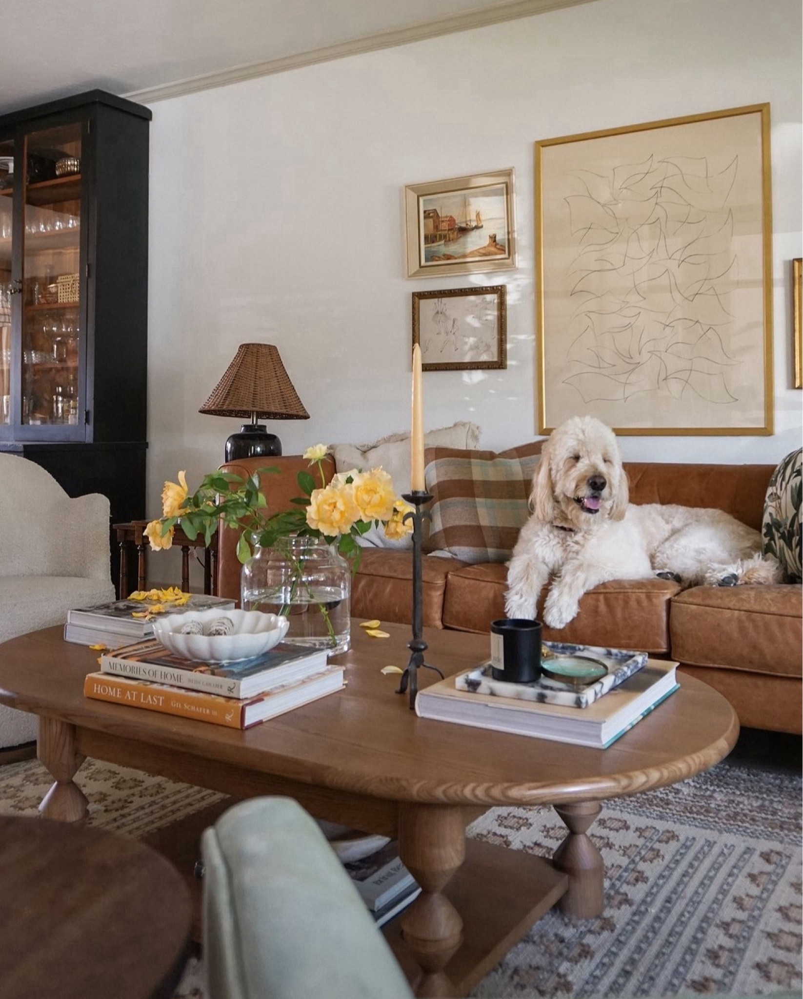 Living room decor. Leather sofa. Coffee table. Coffee table book. Swivel chair. Home decor  

#LTKfindsunder100 #LTKfamily #LTKhome