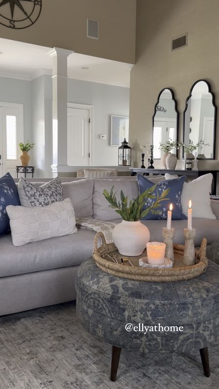 Living room styling. Sofa on sale, area rug on sale, cozy and comfy throw pillows and blankets, black scallop mirrors, coastal tray, vase, marble candleholders, candle. Target, Amazon home, Anthropologie, Ballard Designs. Free shipping. 

#LTKsalealert #LTKhome #LTKfindsunder50