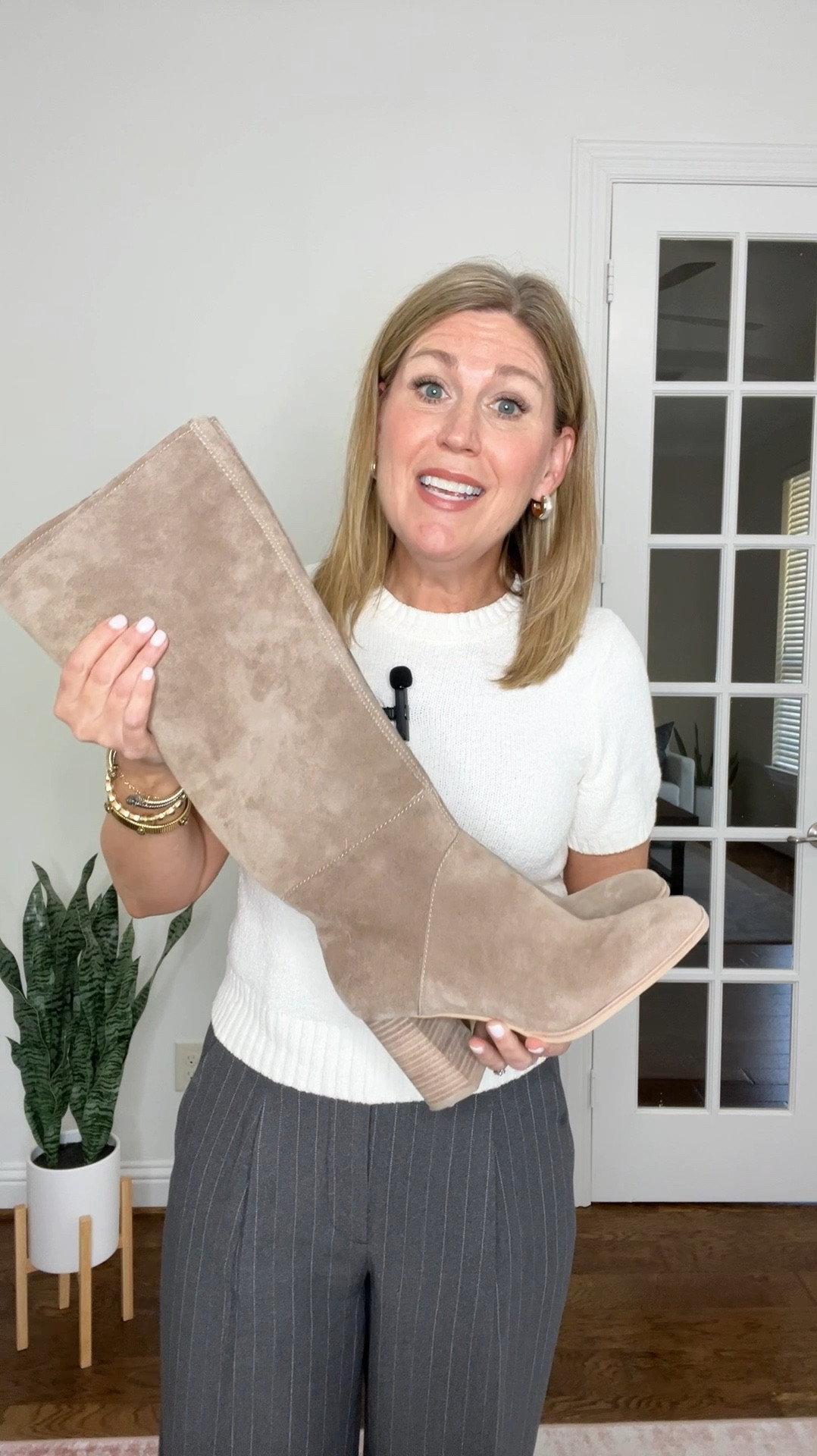 The Fynn boot in Truffle Suede.
It sells out in this color every season, but is currently fully stocked!
This silhouette is sleek, sophisticated, and elevates any outfit.

It has a stacked heel, half zipper inside of the boot, and elastic tab at the top of the boot.

Pair it with a cozy sweater dress, or flowy maxi dress this fall.
The fynn comes in 5 colors and is very comfortable. 
These boots are available in a wide calf as well.
They run snug, but will stretch out slightly. They run tts.

This boot does not disappoint!


#LTKShoeCrush #LTKStyleTip #LTKWorkwear