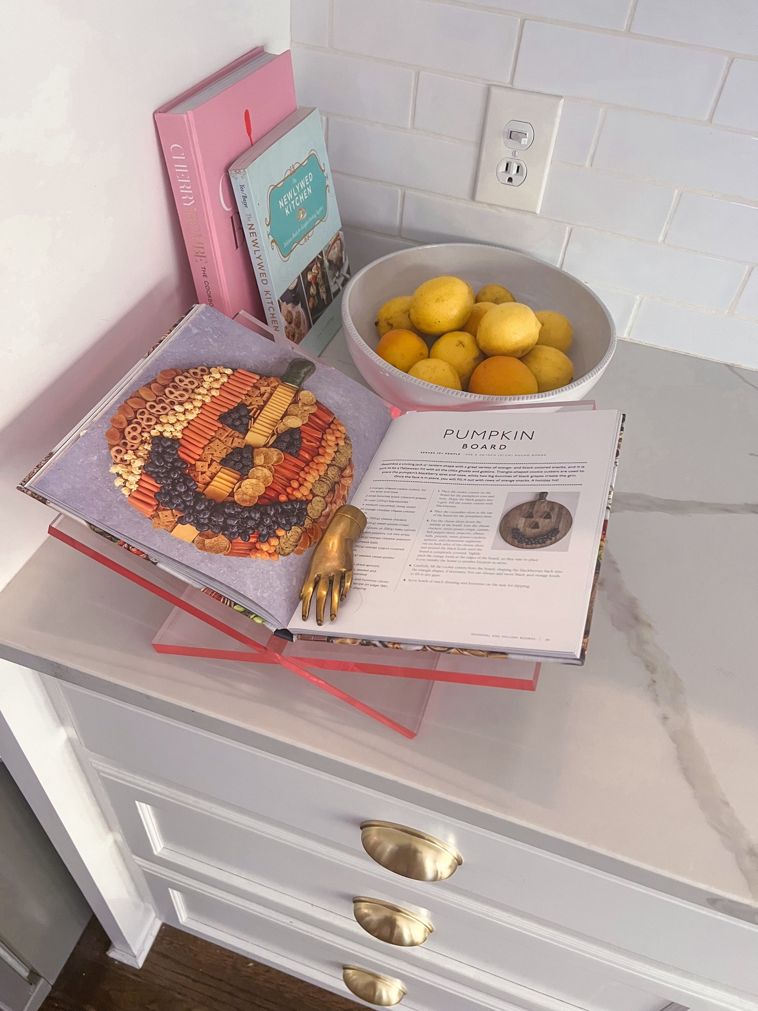 This book stand and gold hand paperweight is so pretty, and I have loved having it styled in my kitchen to hold whatever recipe I am cooking! Would be so cute as a Christmas gift for someone who loves to cook so that they can have their cookbooks open!


Home
Gift idea 
Alice Lane 

#LTKGiftGuide #LTKHome #LTKStyleTip