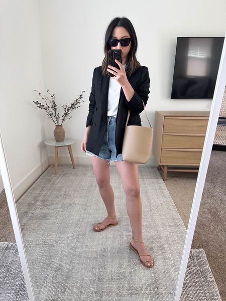 Simple summer outfit. This is my favorite linen blazer. Linked this years version. Size up!

Blazer- Banana Republic petite 4
Tee- Everlane medium
Shorts- AGOLDE 26. Size up 2 sizes.
Sandals- Ancient Greek 35
Bag- The Row
Sunglasses- Celine 

Sandals, summer outfit, petite style, jean shorts 