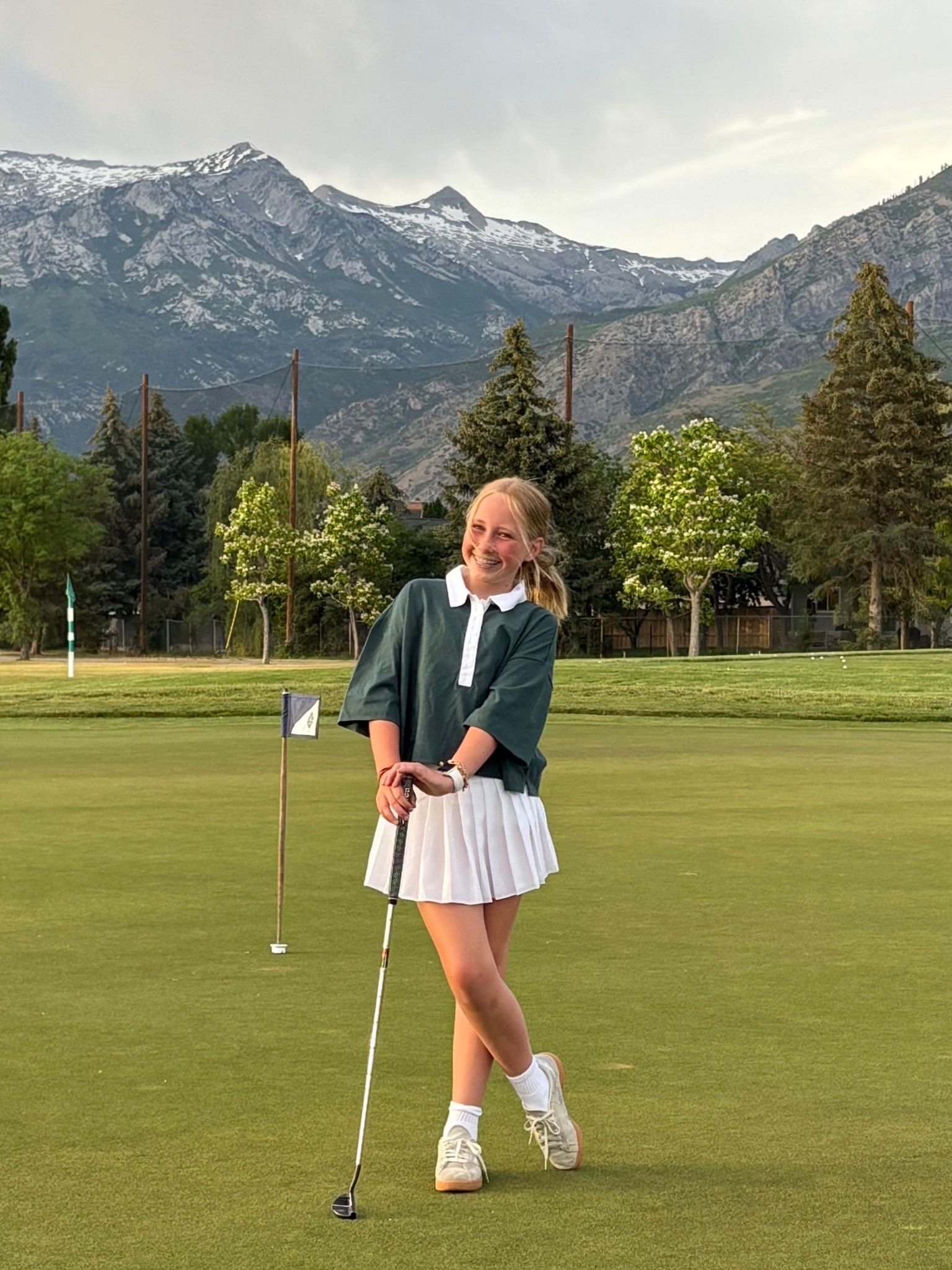 AJ snagged my polo and paired it with her tennis skirt for this adorable golf fit! 

