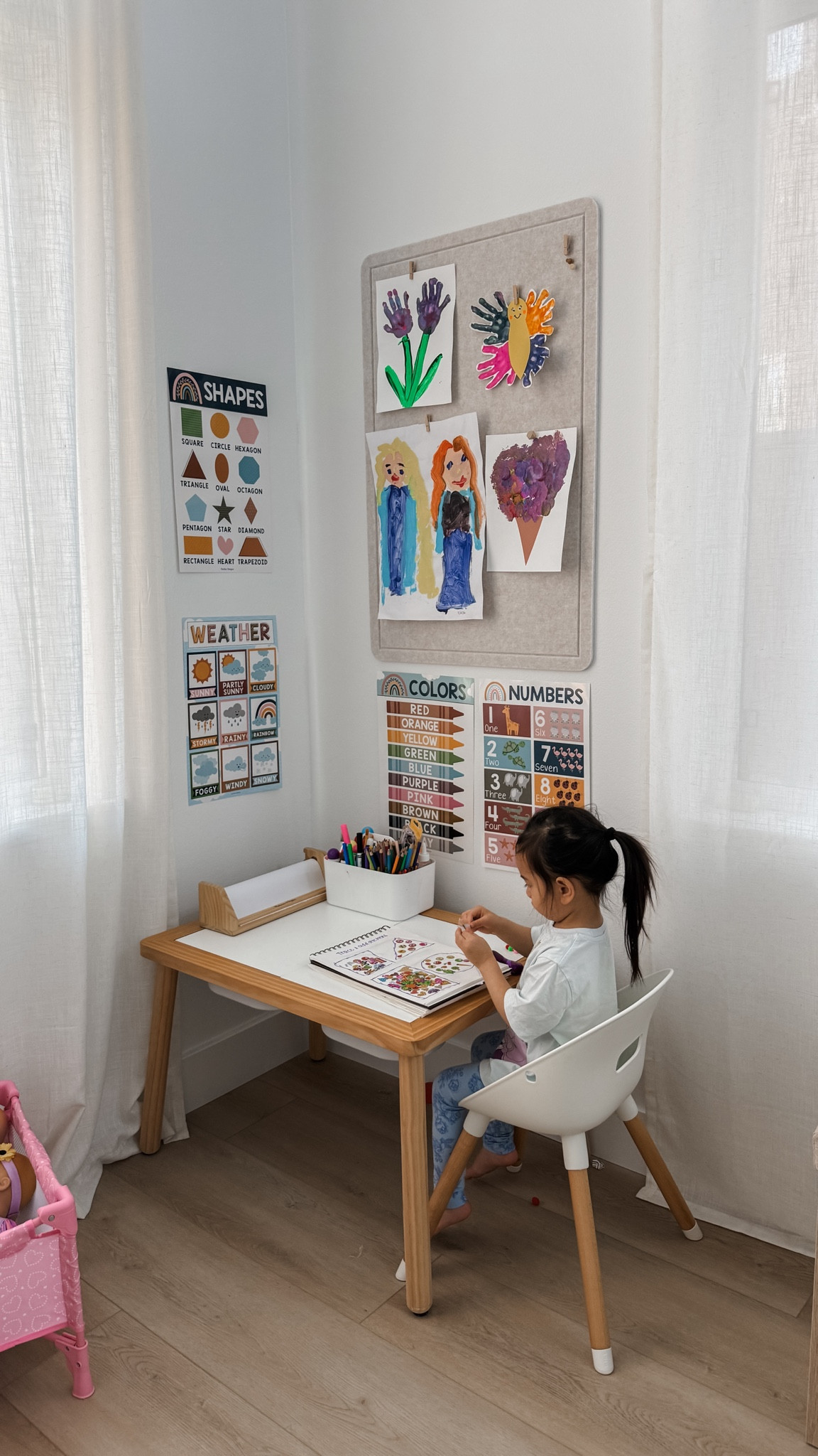 updated our learning table corner! i added a corkboard for her crafts and added the posters! it makes me so happy to see this area 💕 #toddlermom #toddlerlearning #playcorner #playtable #toddleractivities  

 #LTKmomlife #LTKHome #LTKKids