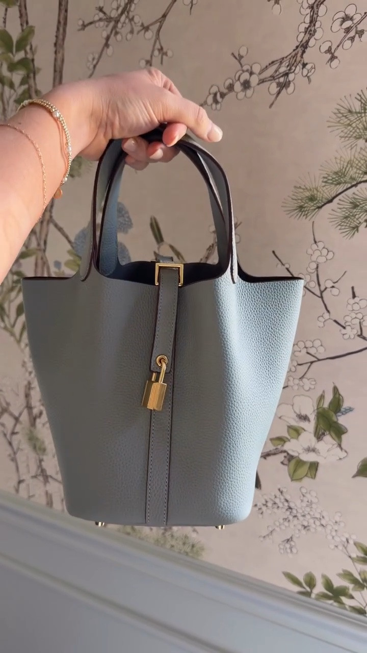 She’s perfect!! This genuine leather bucket bag comes in 8 beautiful colorways.
I did a side by side comparison to the designer version in my stories. $82 vs $5,000!