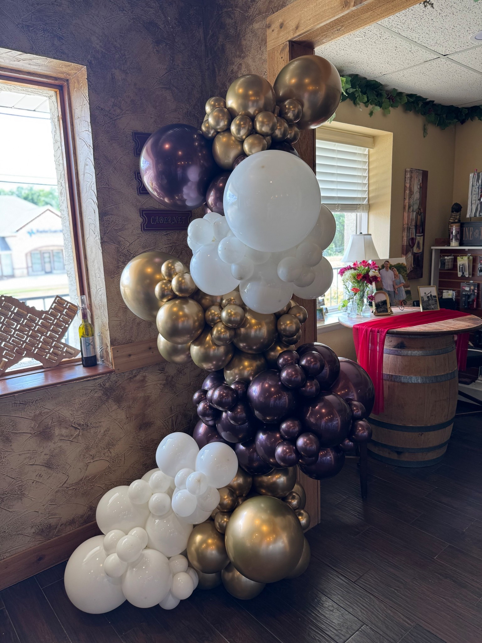 The best balloon column stands and 260 balloons in use to make this free standing garland! Also linked the balloon shine I use to make them super nice and shiny! 

#LTKFindsUnder50