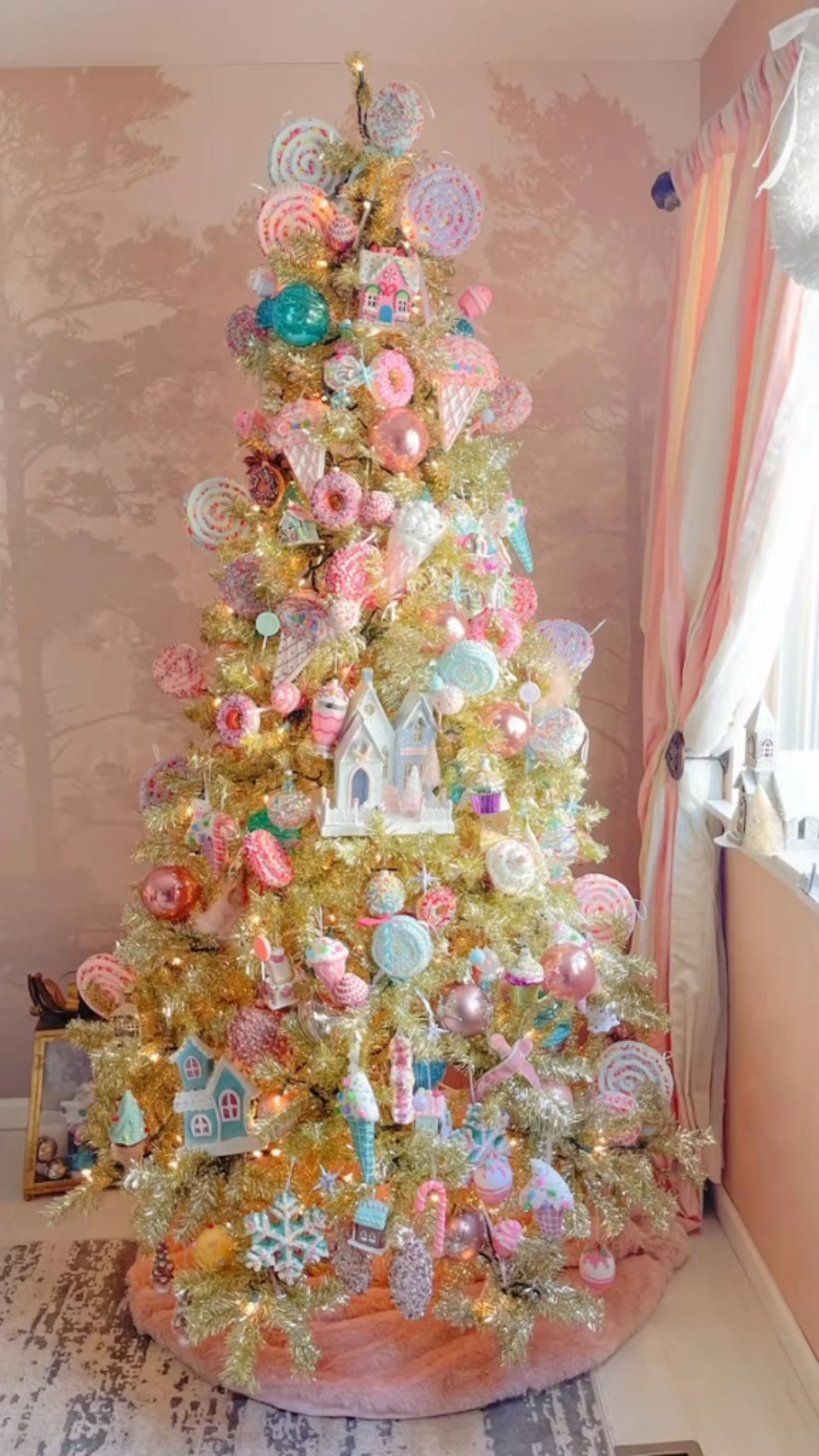 A candy land christmas! 

#christmastree #candyland #betterhomesandgardens 

#LTKHoliday #LTKHome #LTKStyleTip
