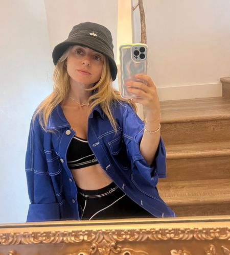 Bucket hat season has commenced 🖤 I love this cobalt blue and black combo so much. It is eye catching and totally cool. Wearing size xxs pants, xs top. 

#streetstyle 
#buckethat 
#summer 
