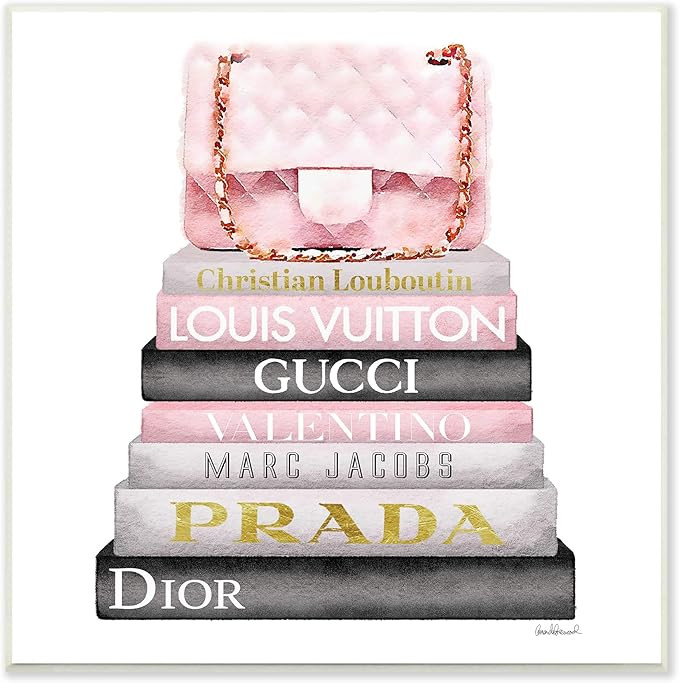 The Stupell Home Decor Collection Watercolor High Fashion Bookstack Padded Pink Bag Wall Plaque A... | Amazon (US)