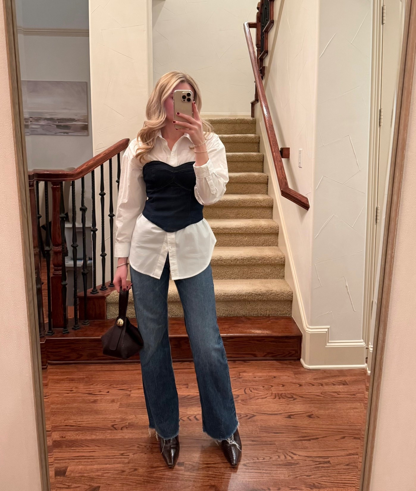 Wearing a size 2 in corset top, small in button down, and 26 in jeans