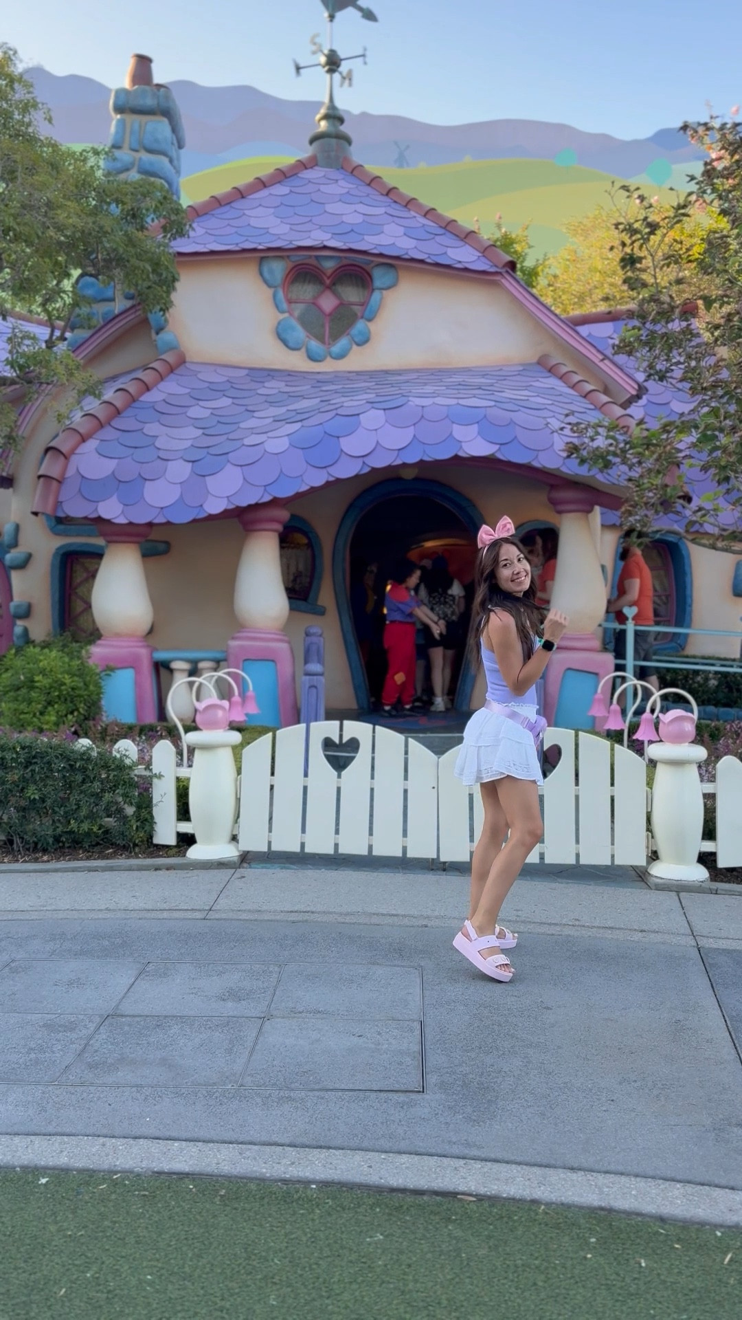 Daisy Duck bound to Disneyland. 
Body suit, pink platforms. 

#LTKPetite #LTKActive #LTKFindsUnder50