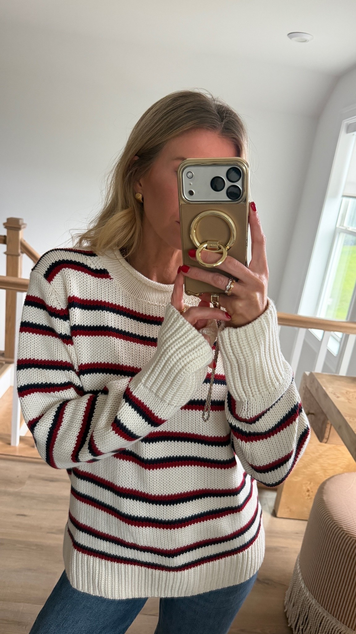 This @Quince rolled neck sweater is new this year and it looks way more expensive than it is. The cream, navy, and red stripe is classic but I also grabbed it in solid navy. It runs very small, size up at least two sizes! I am wearing an XL. #QuincePartner

#LTKstyle #LTKmusthaves

#LTKootd