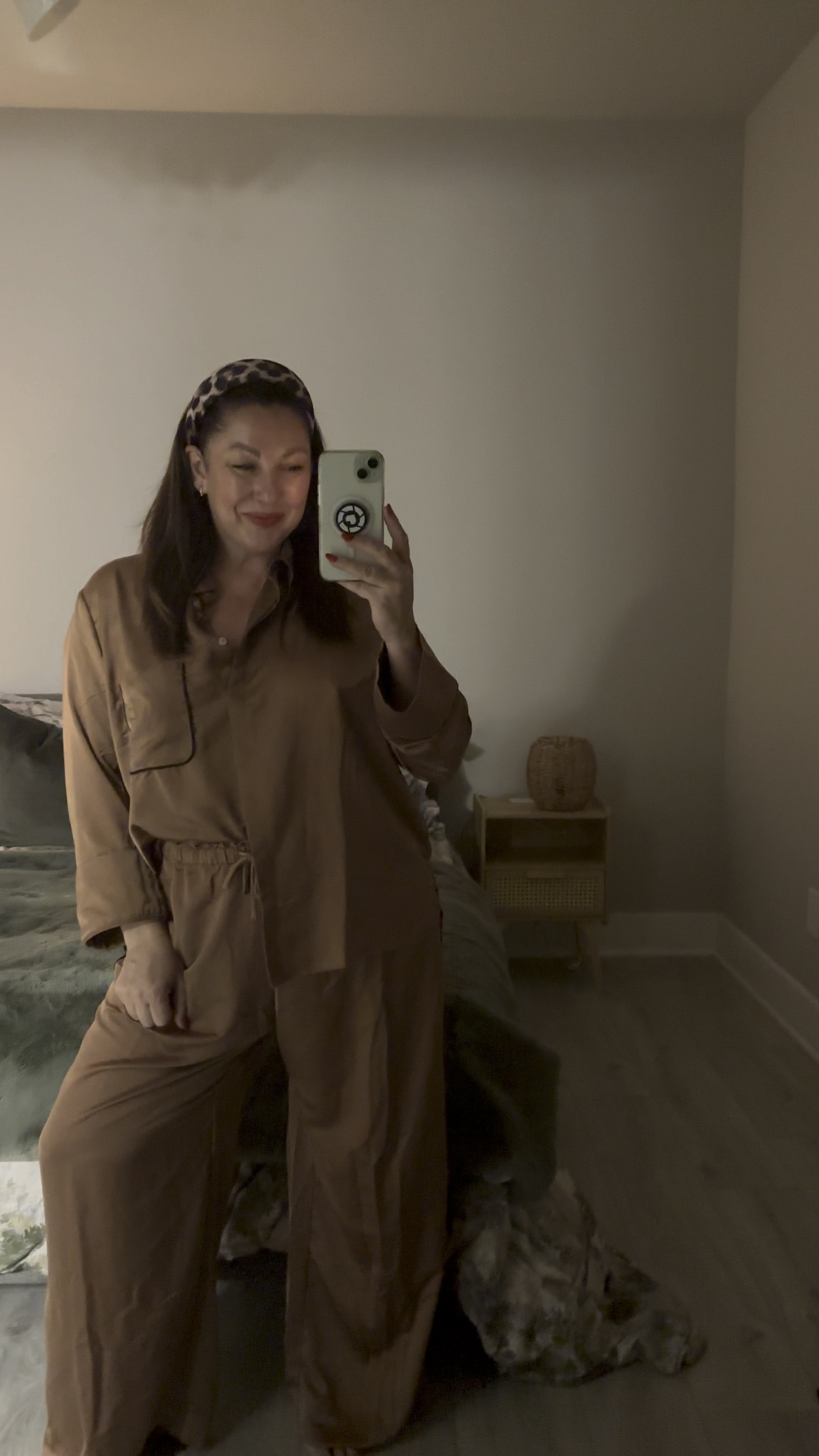 Satin pajamas. Getting the festive mood. And what a great gift! Bare walls as I just moved but you can see the PJ’s better! And a cute leopard hair band to top it off! 

#LTKMidsize #LTKFindsUnder50 #LTKGiftGuide